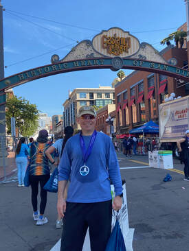 Dr. Brewer is pictured at the conclusion of the San Diego Half Marathon in March 2023.