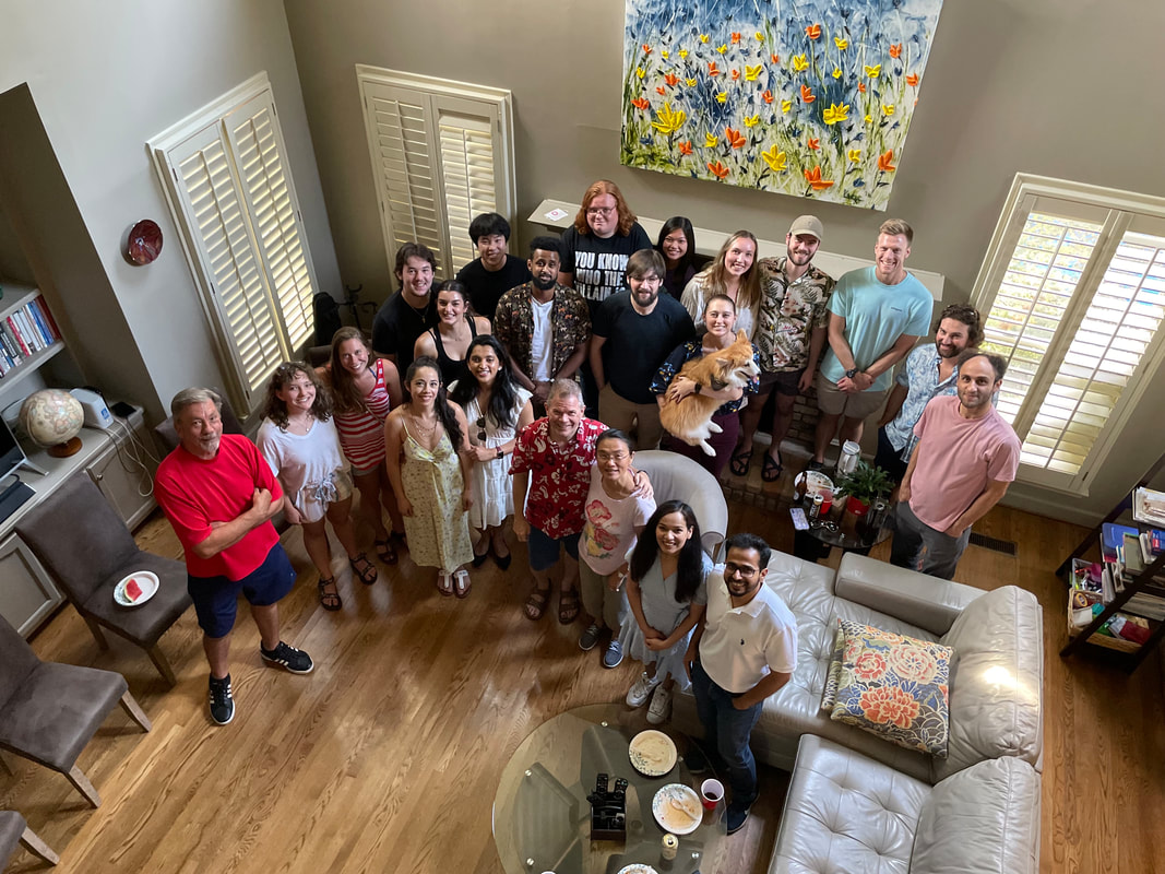 Dr. Brewer's group pictured at his home.