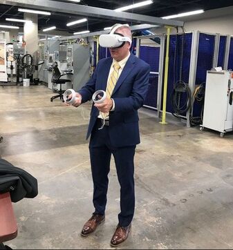 Dr. Brewer using VR station